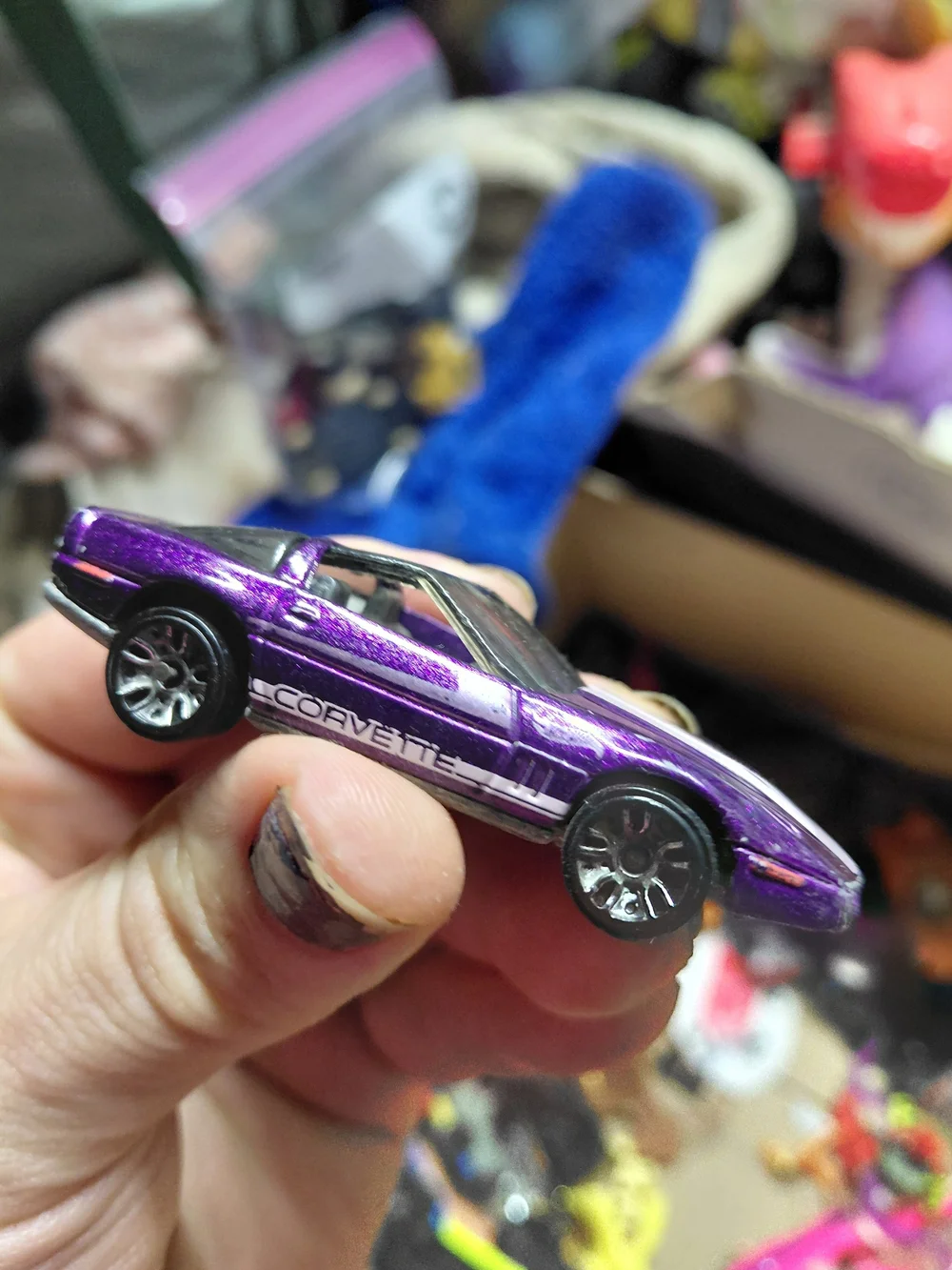 1:64 scale Hot Wheels '80s Corvette, likely from the 2012 Vintage or 2013 HW Sho